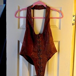 Chocolate Snake faux suede dip hem lace up top